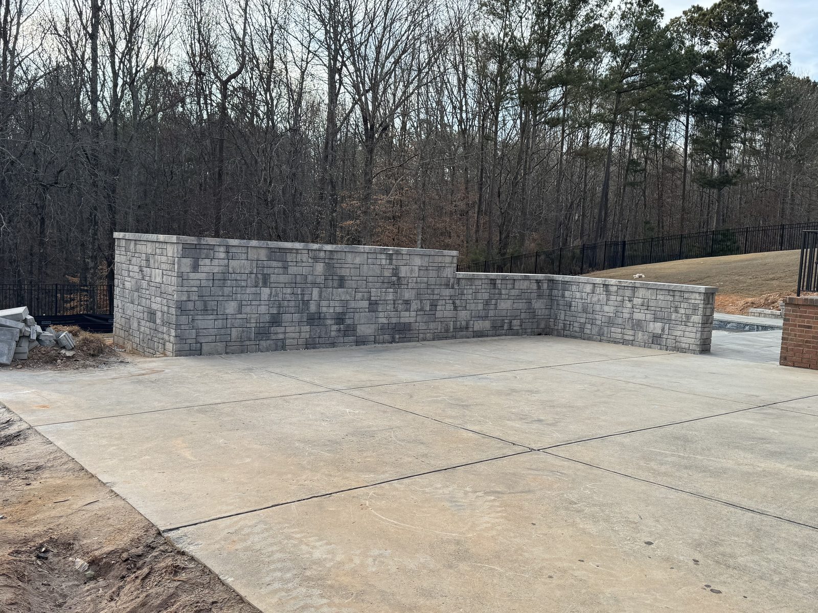 Finished retaining wall around patio