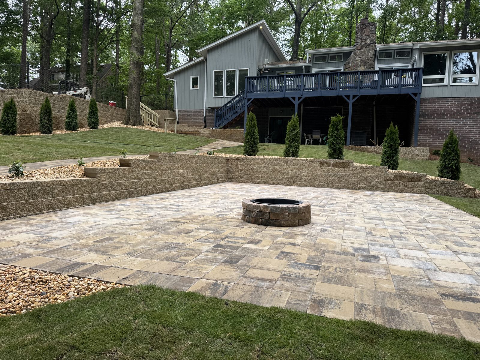 Paver patio with circular firepit feature